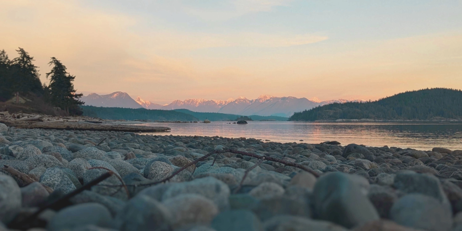 Hollyhock — A Cortes Island oasis Cortes view of the ocean at sunset