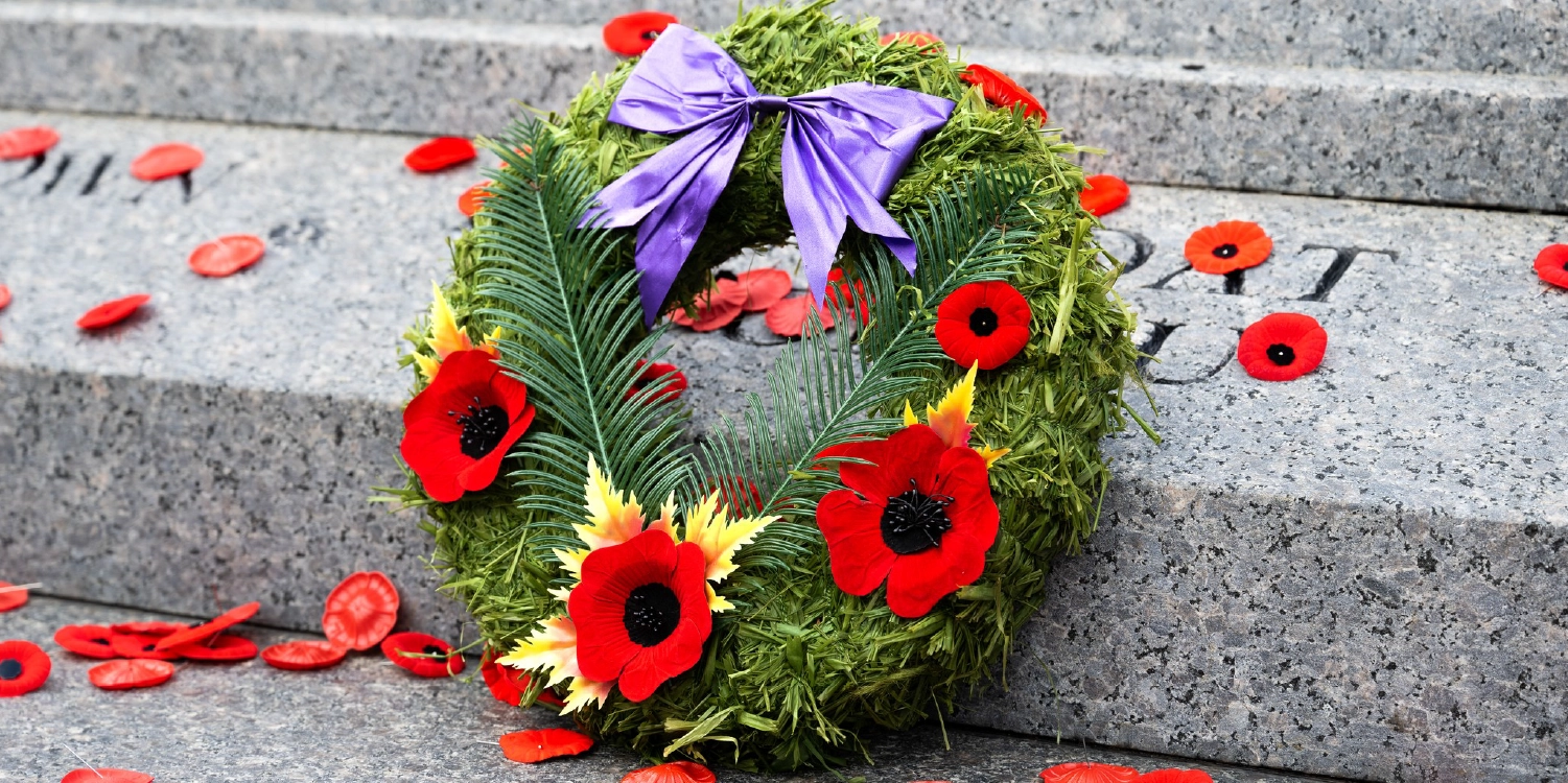 a wreath lays on the cenotaph steps