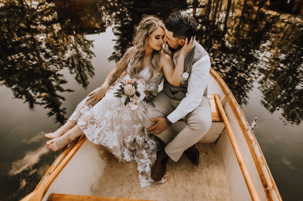 Featured Photographer: Emily Palmer Wedding couple in canoe photographed by Vancouver Island photographer Emily Palmer