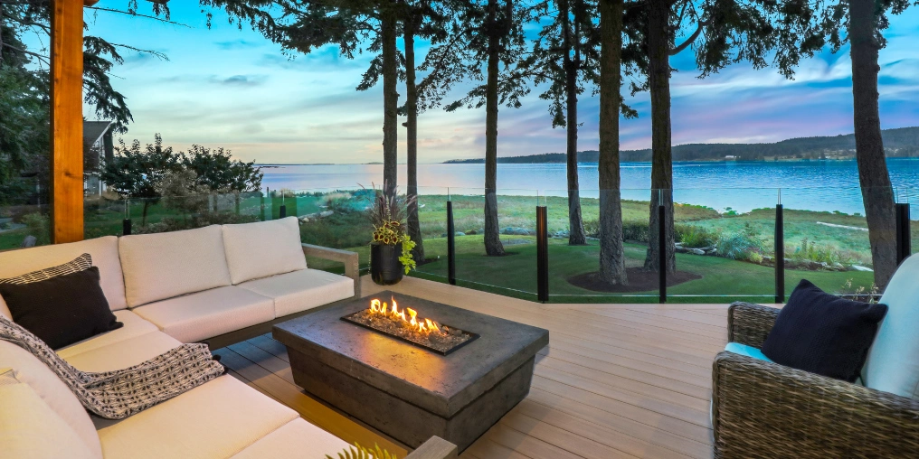 Covered deck with ocean views from completed waterfront home construction project on Vancouver Island