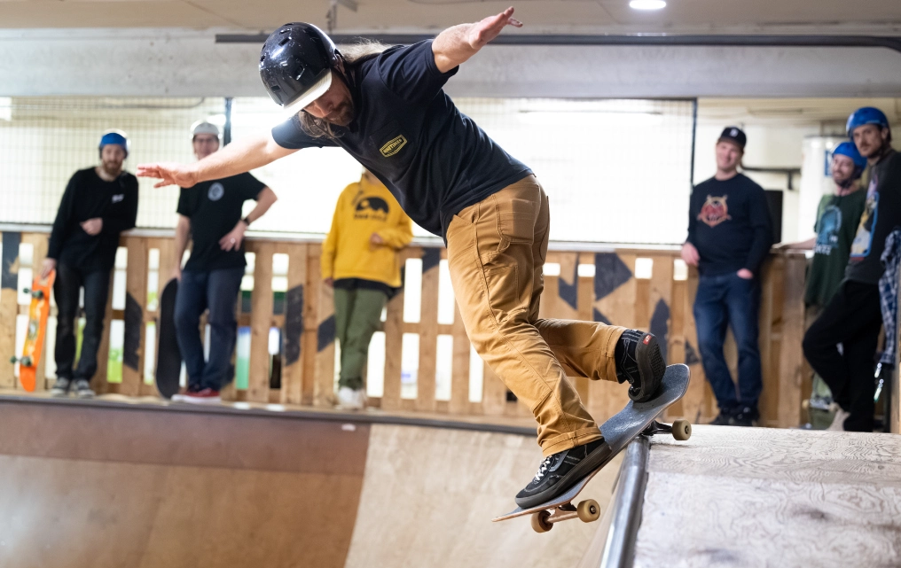 Skateboarder catching air in bowl at LINC Youth Centre Courtenay Monday night session