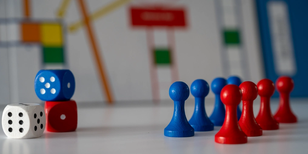 dice and game pieces set up on a table