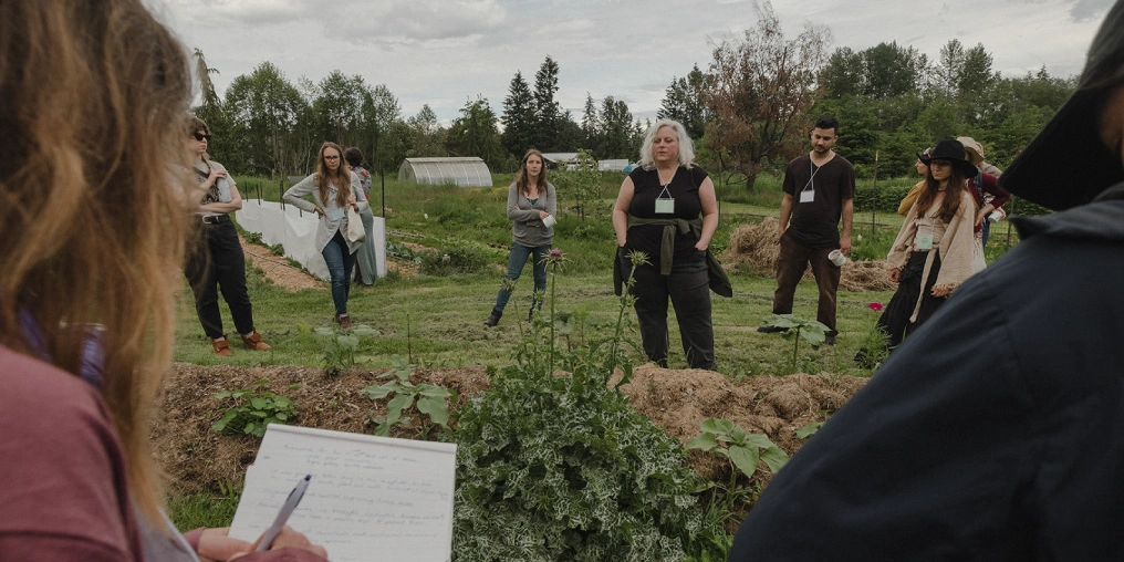 erbalists gather for an outdoor workshop at the Vancouver Island Herb Gathering at Innisfree Farm