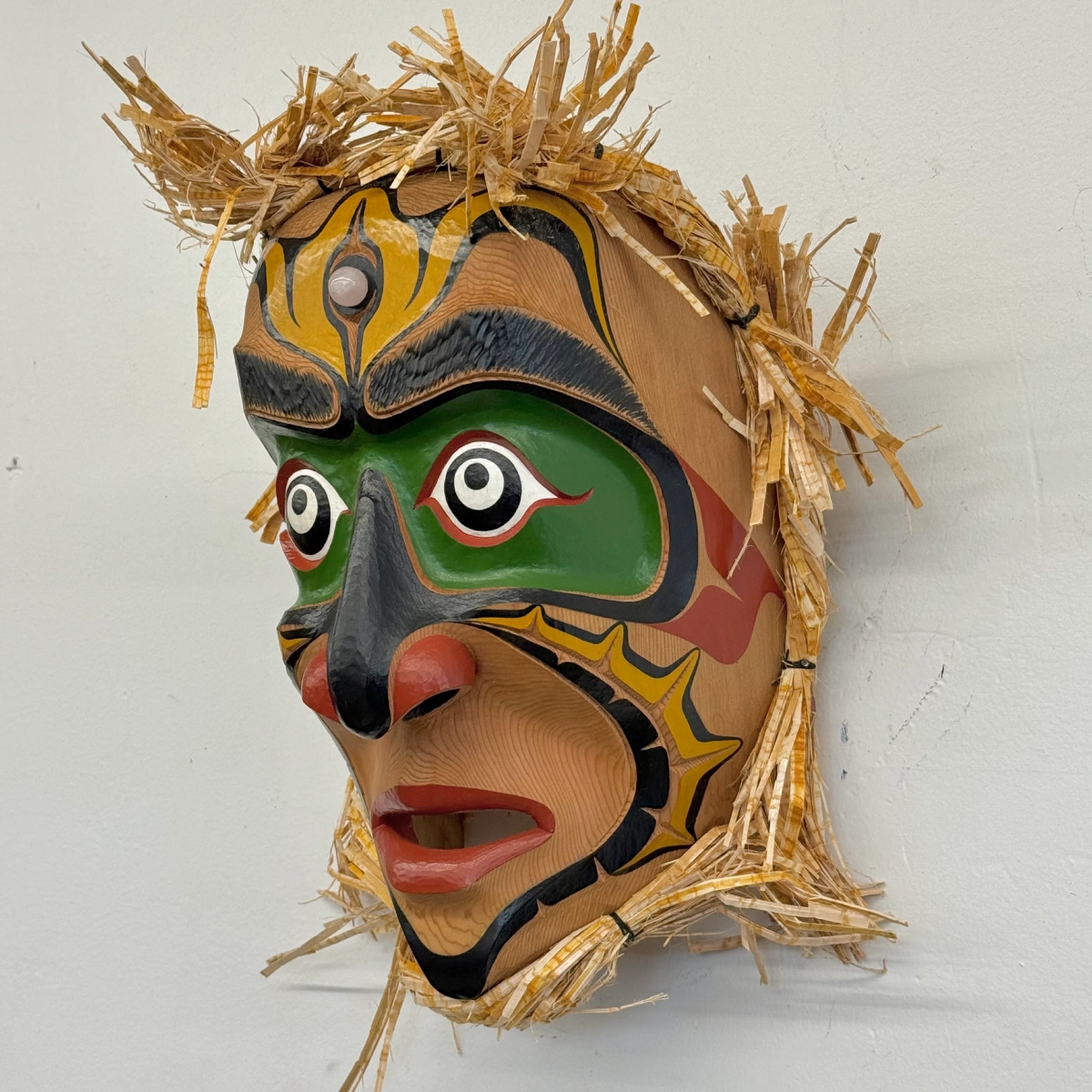 james-kwaksistala-speaker-mask James Kwaksistala's speaker mask made from Red cedar, acrylics paint, crystal and cedar bark