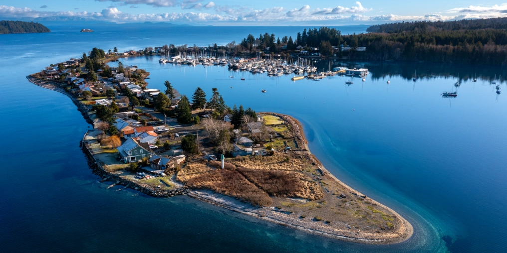 Aerial view of Deep Bay spit and marina in Lighthouse Country, Vancouver Island