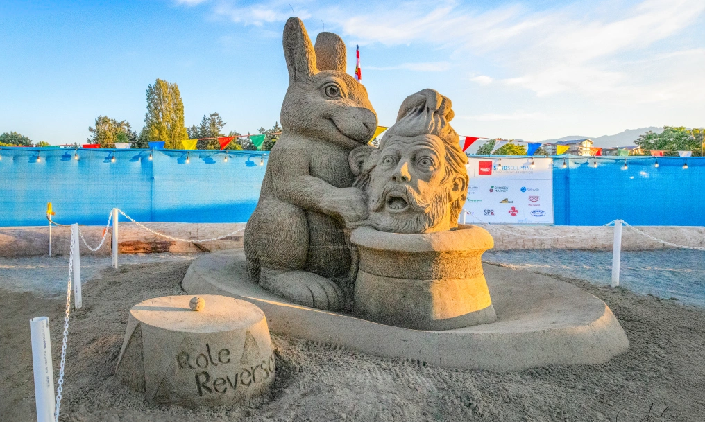 The life of an artist and the legacy of our local competition A finished sand sculpture titled "Role Reversal," featuring a rabbit and a bearded man's face