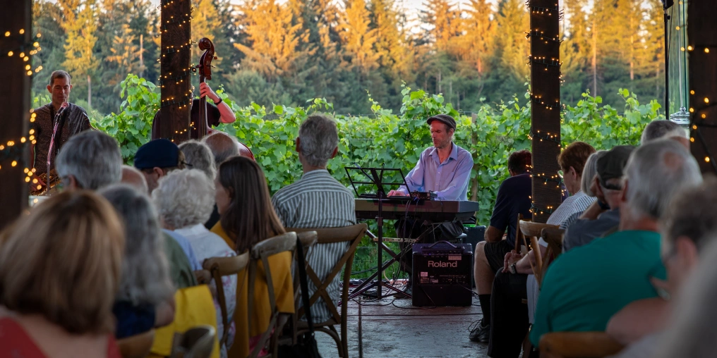 Georgia Straight Jazz Society celebrates two decades of jazz in the Comox Valley Perry White and Trio perform among the vineyard rows at sunset