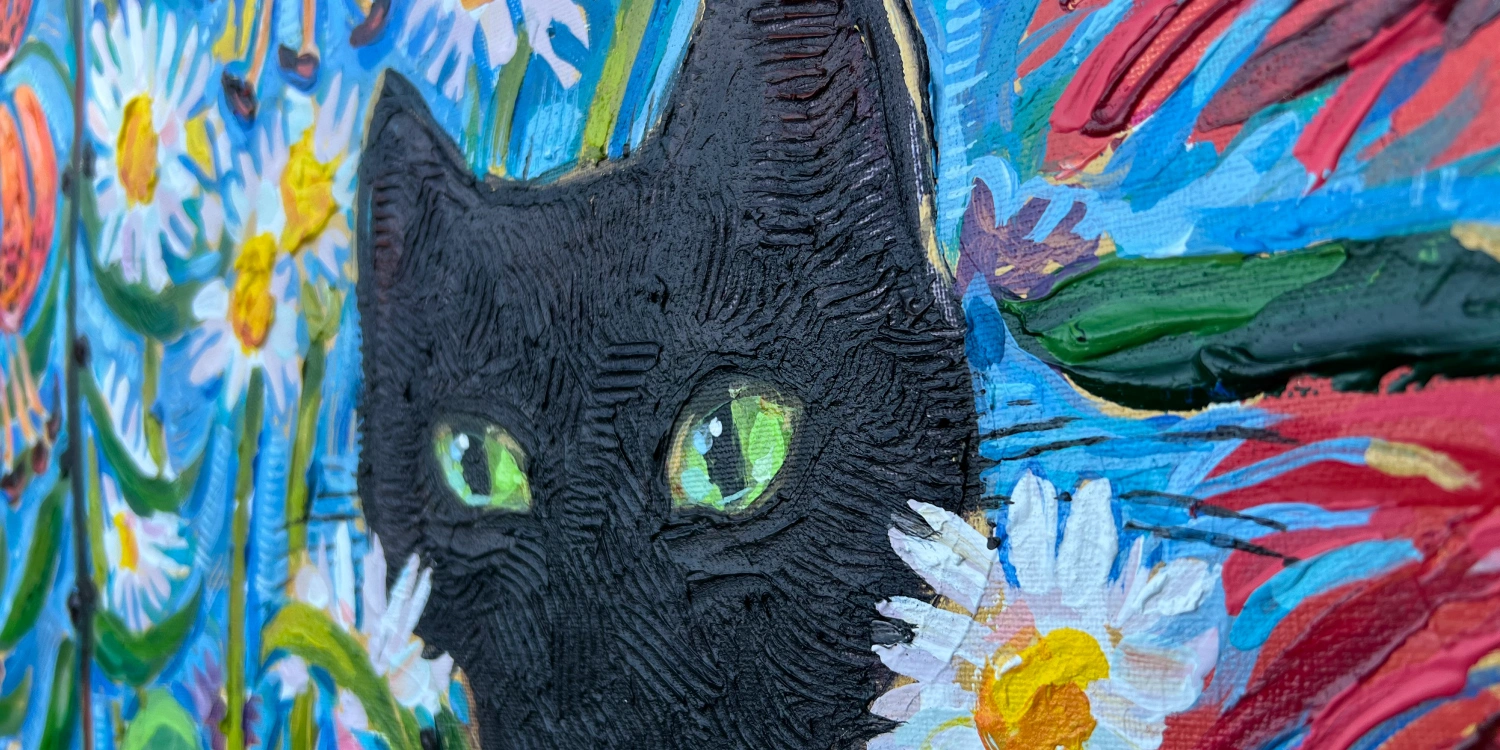 kat-cearns Close-up detail of a black cat painting by Coombs artist Kat Cearns, surrounded by daisies and wildflowers