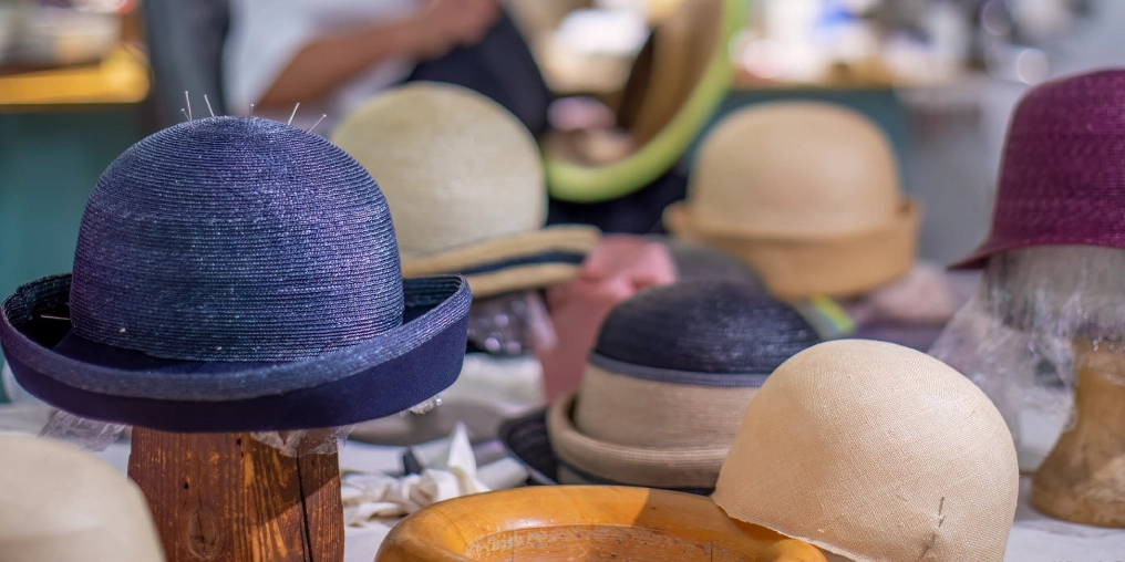 Piroska Mueller loves creating beautiful, one-of-a-kind hats Straw hats in progress, pinned to wooden hat blocks in a millinery studio